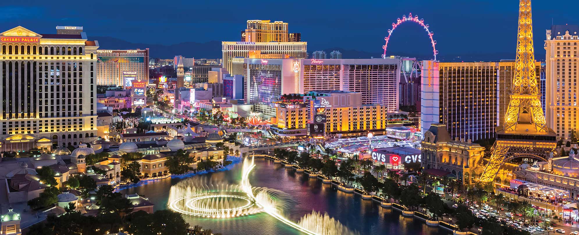 Birds-eye-view of the Strip in Las Vegas, Nevada, with fountains, hotels, casinos and other top Las Vegas attractions.