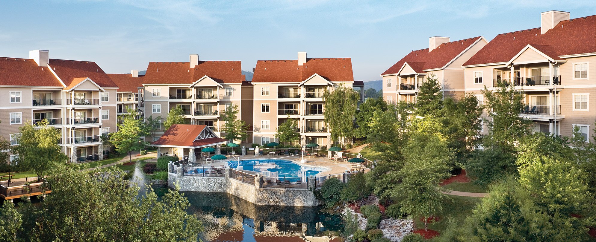 The exterior and pool at Club Wyndham Branson at the Meadows, a timeshare resort in Branson, Missouri.