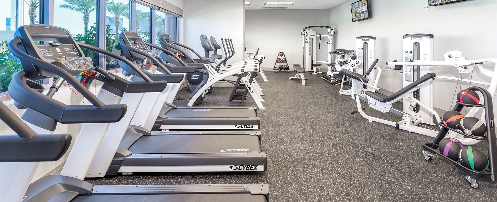 Treadmills and gym equipment in the fitness center at Margaritaville Vacation Club by Wyndham - Desert Blue in Las Vegas, NV.